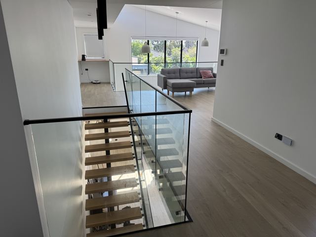 Your friends' landing: the open stair beside the lounge.