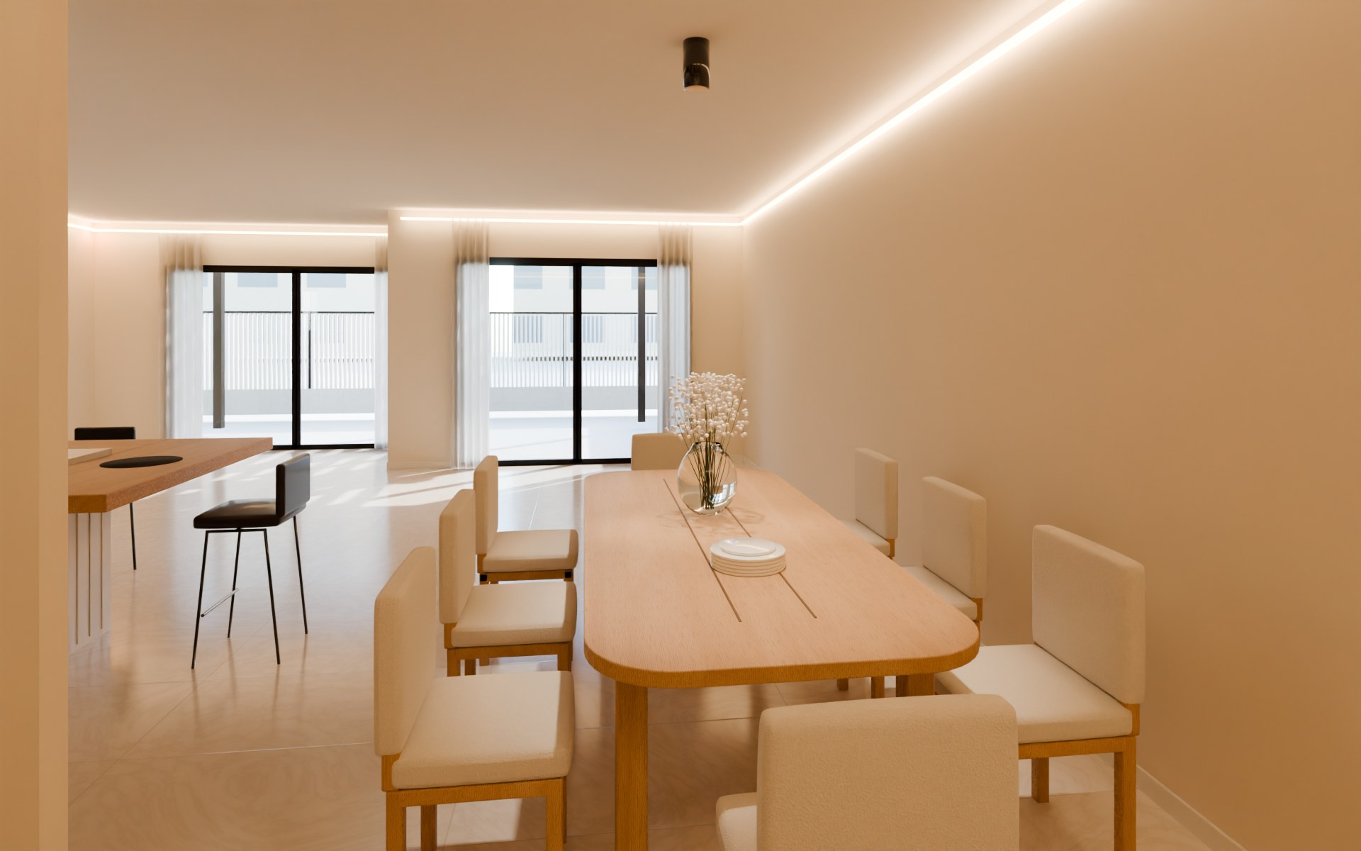 The oak dining table for eight with cream upholstered chairs, seen from the reception toward the garden